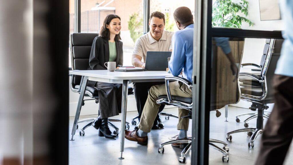 business-colleagues-working-together-in-busy-modern-office.jpg