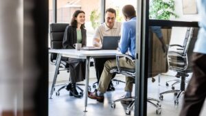 business-colleagues-working-together-in-busy-modern-office.jpg